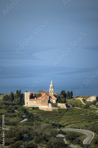 Benedictine monastery of St. Nicholas on the hill above fisherman's town Komiza on island Vis in Croatia