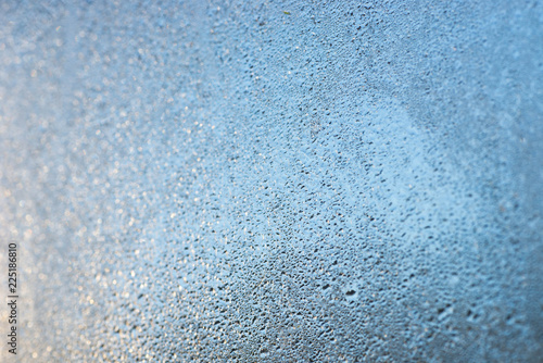 window glass with condensation, water drops background selective focus