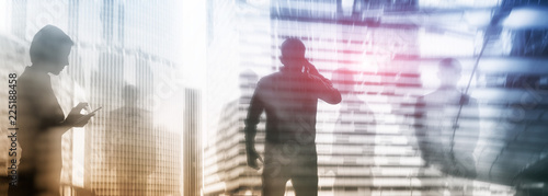 The double exposure image of the business man with cityscape image.