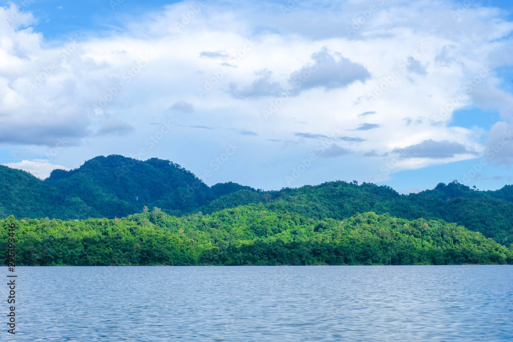 The atmosphere in the dam is clear sky, clear water, mountains hundreds of green trees. Recommend to relax during the holidays,Khao Laem Dam Top Tourist Destinations in Thailand The atmosphere in the dam is clear sky, clear water, mountains hundreds of green trees. Recommend to relax during the holidays,Khao Laem Dam Top Tourist Destinations in Thailand