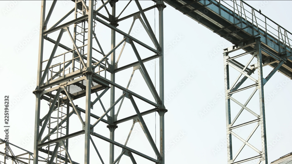 Iron construction with sky background. Abstract steel frame counstruction in a factory. Iron construction with sky background. Abstract steel frame counstruction in a factory.