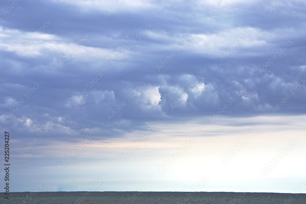 Dramatic, wind-swept clouds over the Chesapeake Bay.