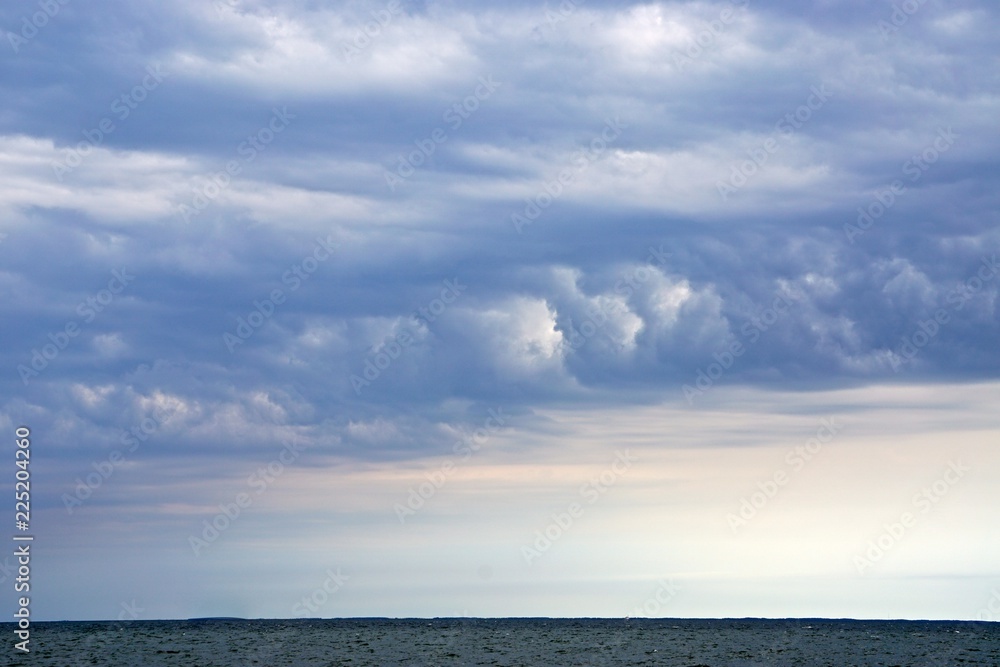 Dramatic, wind-swept clouds over the Chesapeake Bay.