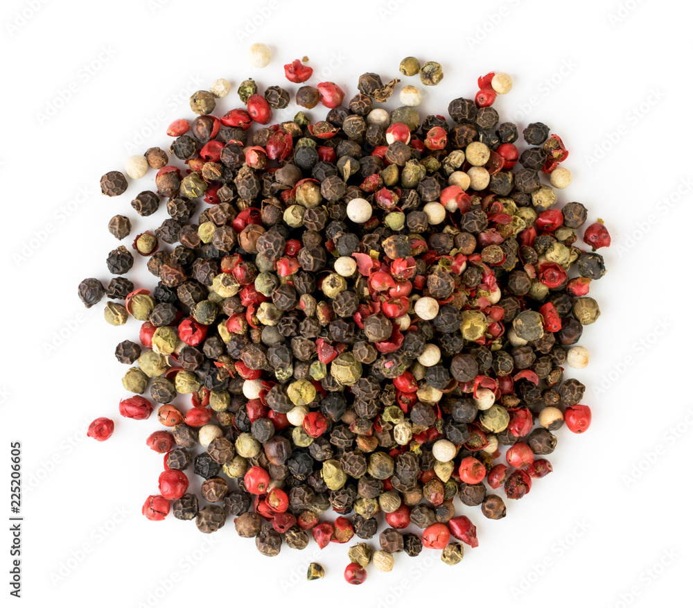 A bunch of pepper mix peas on a white. The view from the top. A bunch of pepper mix peas on a white. The view from the top.