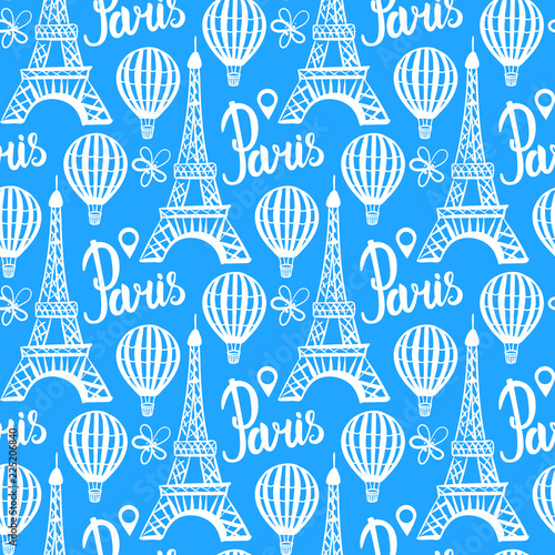 Winter seamless pattern. Paris Eiffel Tower. Vector white illustration isolated on blue background.