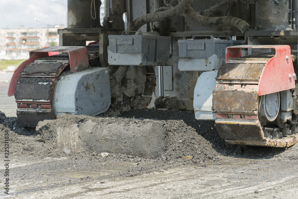 Machinery for asphalting roads. Road Roller works to cut a path Machinery for asphalting roads. Road Roller works to cut a path