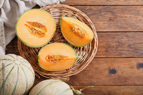 cantaloupe melon on wooden table