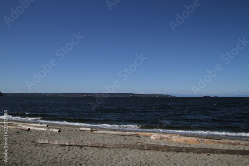 A view of container ships on the horizon