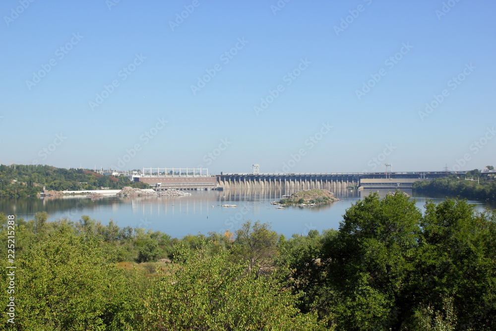 DneproGES. Hydroelectric power station on Dnieper River in Ukraine. Creation of electricity on water DneproGES. Hydroelectric power station on Dnieper River in Ukraine. Creation of electricity on water