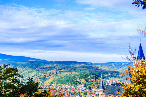 Autumn landscape with castle of Wernigerode in Germany