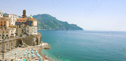 Stunning sunny view of Atrani village overhanging the sea, Amalfi Coast, Italy. Banner panorama. Copy space. © zigres