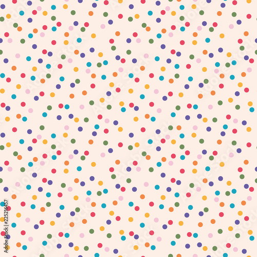 Lovely bright colorful wild polka dot pattern on cream coloured background. Suitable for party invitations, card design or fabrics.