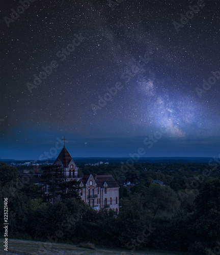 Vibrant Milky Way composite image over landscape of River Thames on Richmond Hill in London.