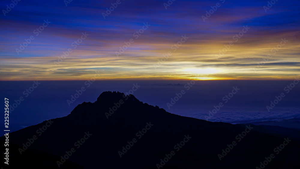 Sunrise at the top of Kilimanjaro, Machame route, Tanzania Sunrise at the top of Kilimanjaro, Machame route, Tanzania