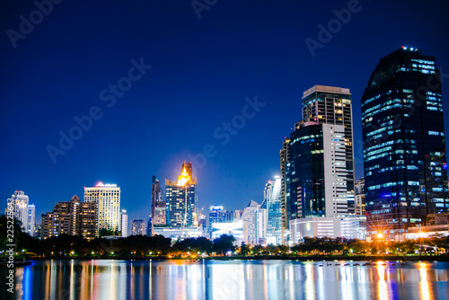 cityscape at night and a reflection of the river at Bangkok, Thailand
