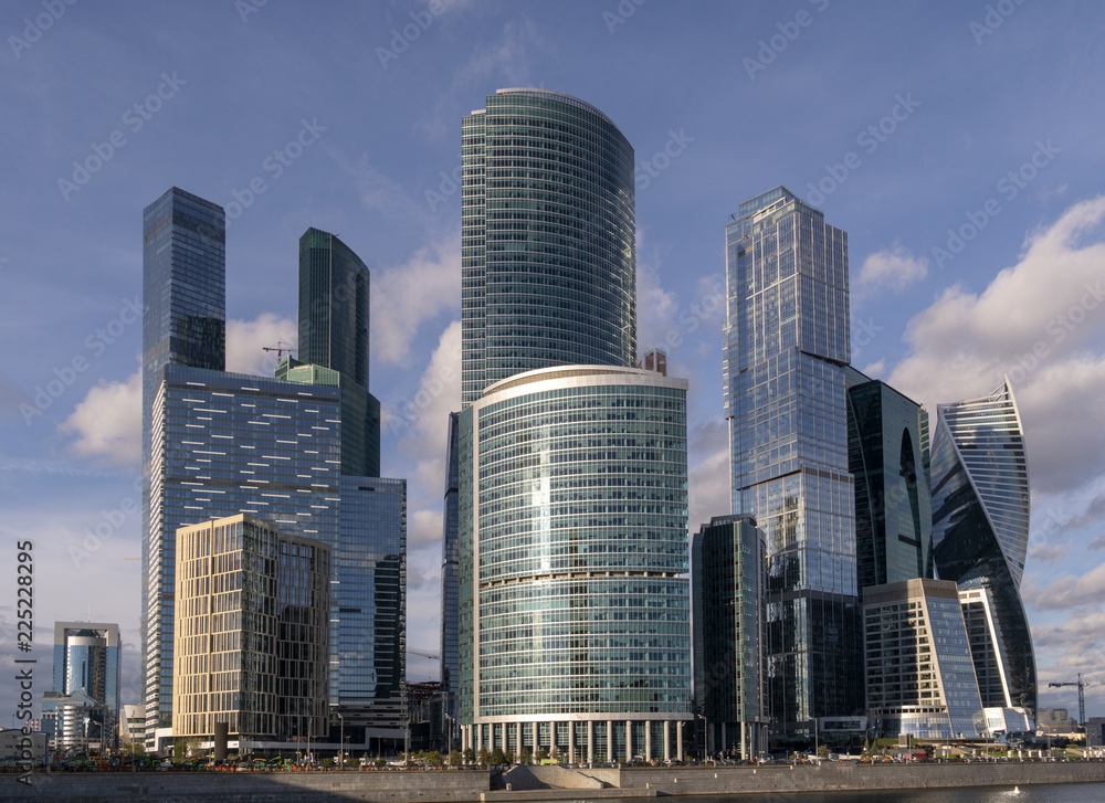 Skyscrapers in the rays of sunset. Skyscrapers in the rays of sunset.