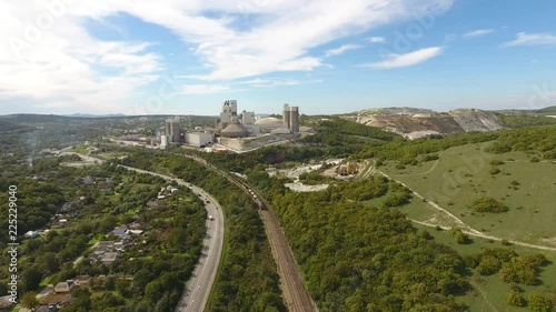 Verkhnebakansky cement plant, top view. Factory for the production and preparation of building cement. Cement industry.