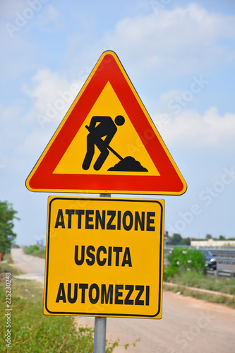 Attention road sign.