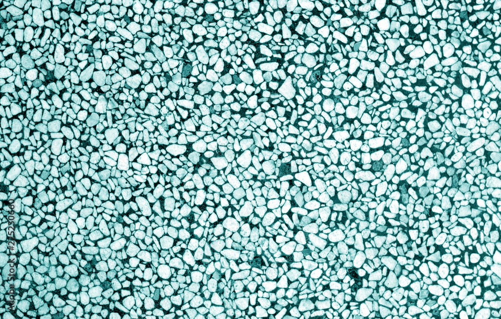 Wall made of small stones in cyan tone. Wall made of small stones in cyan tone.