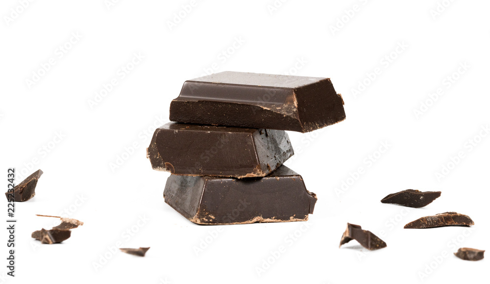 Chocolate pieces on white background Chocolate pieces on white background