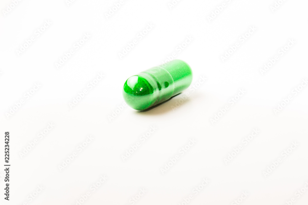 Naklejka premium Pill isolated on white. Room for your text