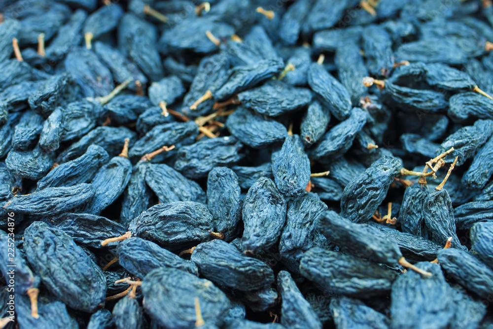 Background of dark raisins, dried grapes Background of dark raisins, dried grapes