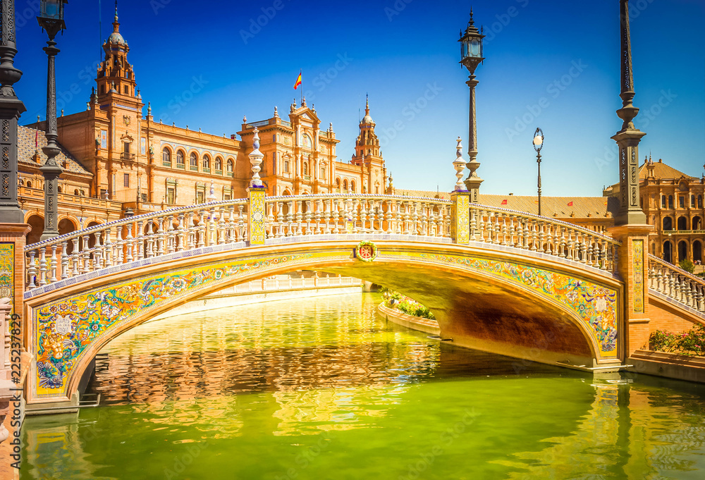 bridge of Plaza de Espana, square of Spain, summer day, in Seville, Spain, toned