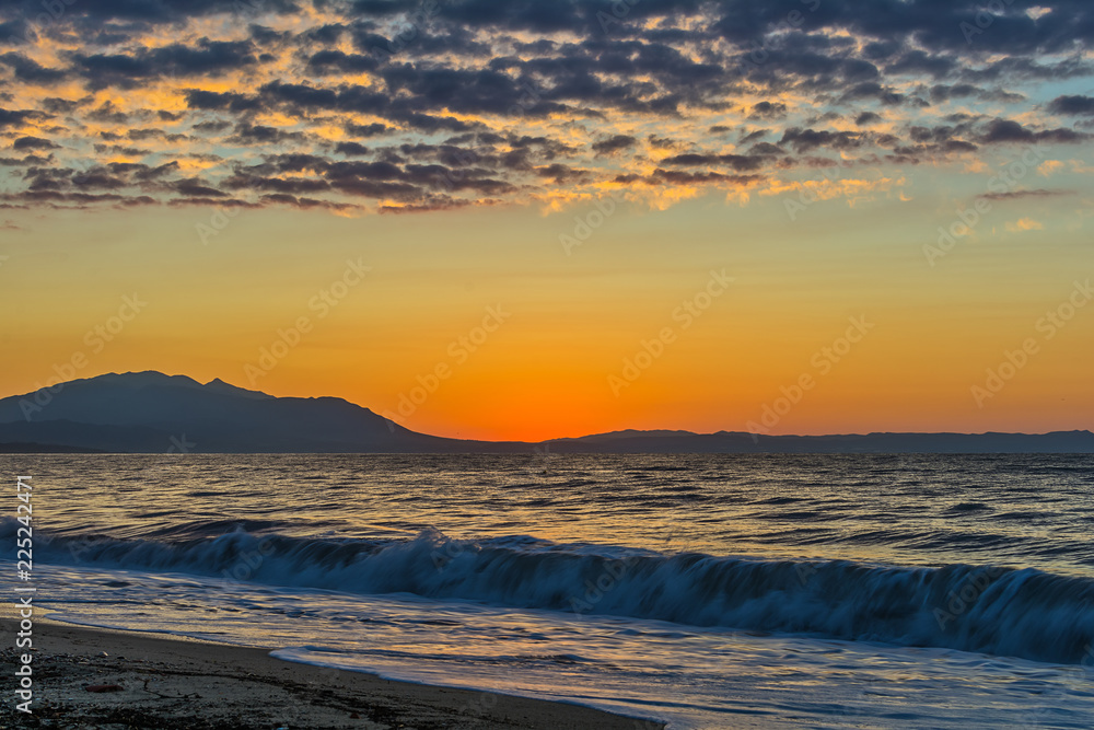 Early morning , dramatic sunrise over sea. Photographed in Asprovalta, Greece Early morning , dramatic sunrise over sea. Photographed in Asprovalta, Greece
