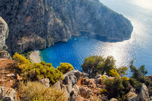 Fototapeta Naklejka Na Ścianę i Meble -  Aerial view of Butterfly valley in Oludeniz. Sunny summer beach landscape top view. Fethiye, Turkey nature landmark