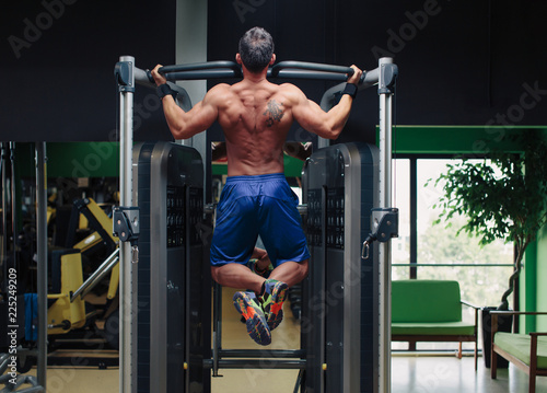 Man doing back training in the gym