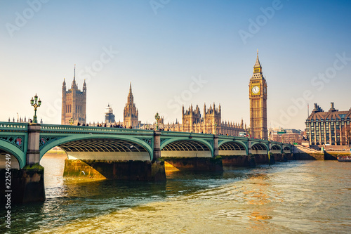Big Ben and westminster bridge in London at autumn