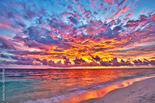 Colorful sunset over ocean on Maldives © sborisov