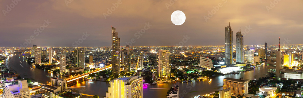 Panorama view Bangkok city and river with moon in night Cityscape Thailand