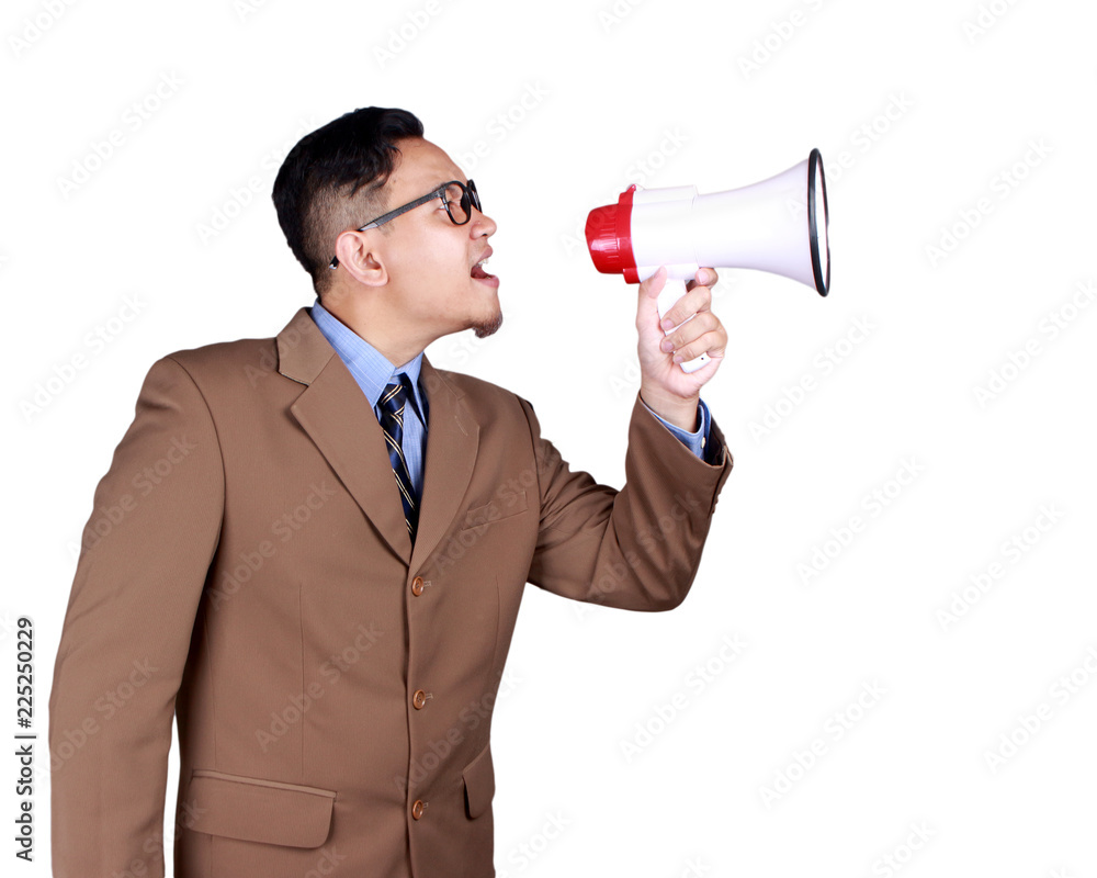 Young Businessman Screaming Uses Megaphone, Copy Space Young Businessman Screaming Uses Megaphone, Copy Space