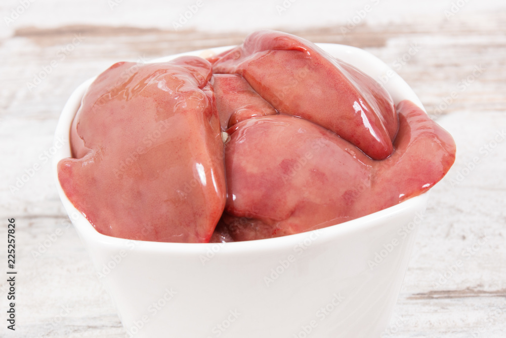 Chicken liver in glass bowl, healthy nutrition as source minerals Chicken liver in glass bowl, healthy nutrition as source minerals
