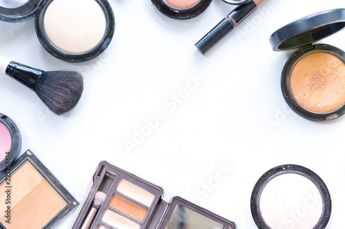 makeup brush and palette for makeup on white background,Top View,Beauty concept.