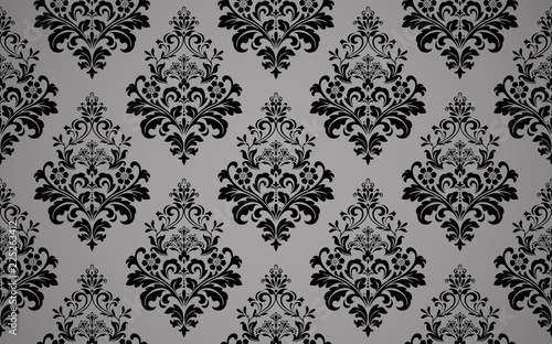 Wallpaper in the style of Baroque. Seamless vector background. Black and grey floral ornament. Graphic pattern for fabric, wallpaper, packaging. Ornate Damask flower ornament