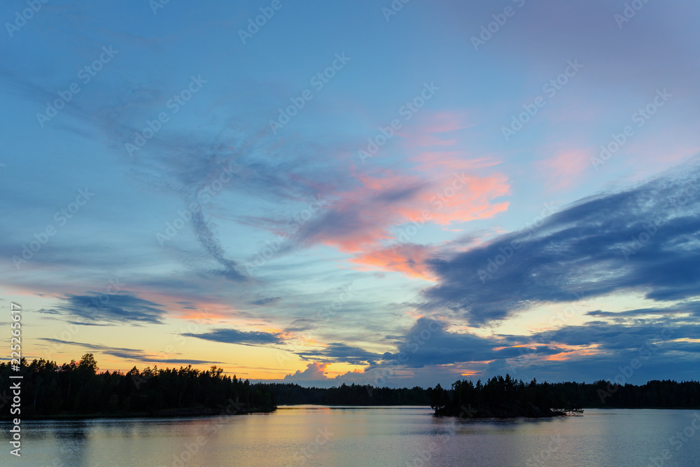 sunset with clouds over the forest lake sunset with clouds over the forest lake