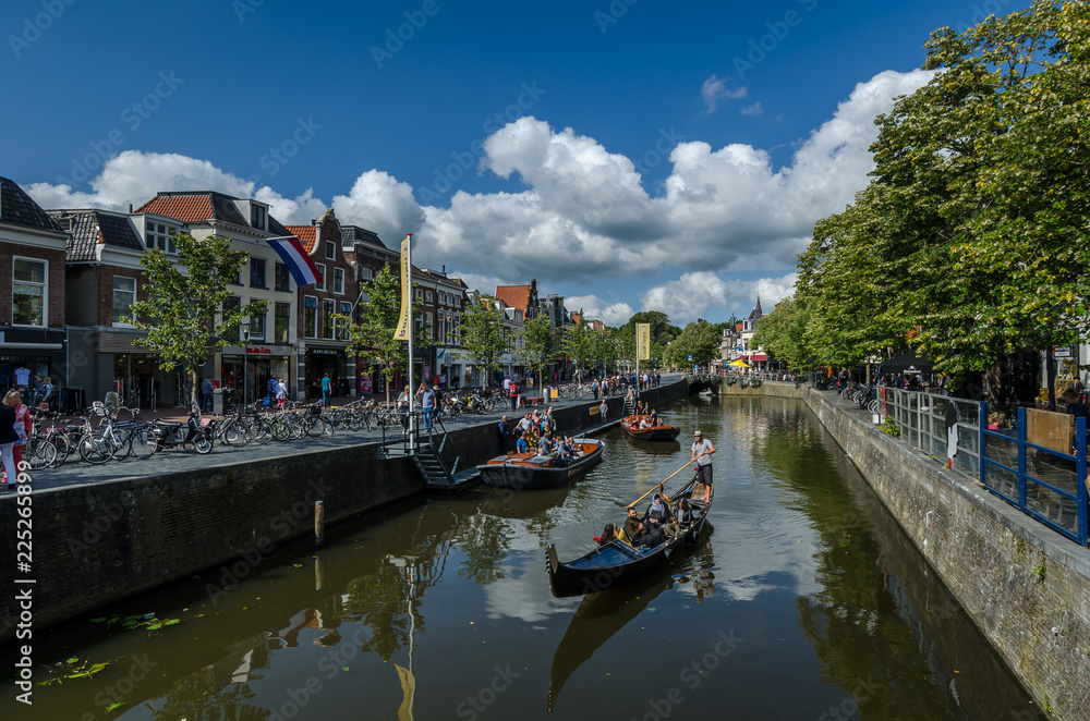 LEEUWARDEN, FRIESLAND, NETHERLANDS 9 august 2018: Leeuwarden canel with boats and people