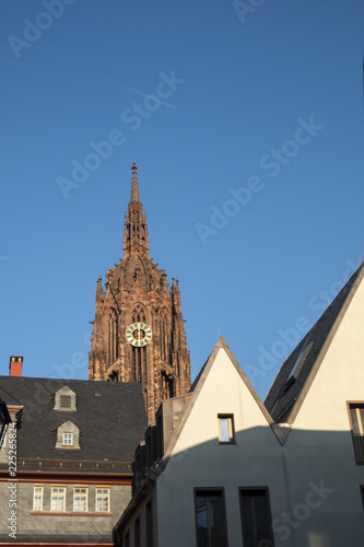 view to houses of reconstructed old town in Frankfurt with dome in background