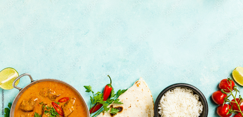 Traditional curry on blue background - obrazy, fototapety, plakaty 