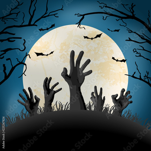 Halloween zombie hand in front of full moon