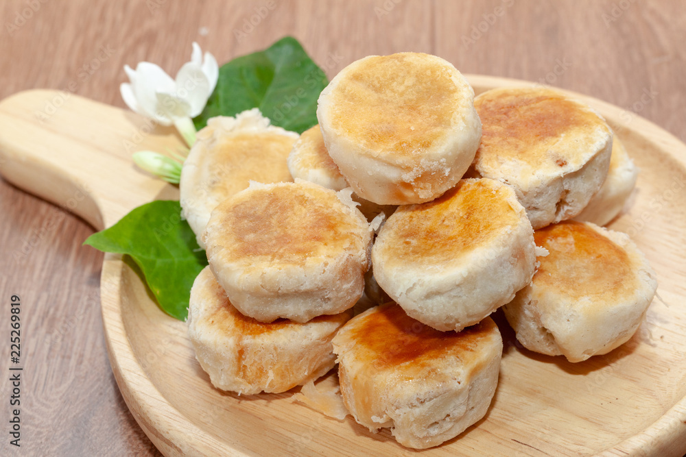 tao sor cake or moon cake in Phuket Thailand on wooden plate tao sor cake or moon cake in Phuket Thailand on wooden plate