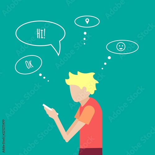 Boy communicates in social networks on a smartphone