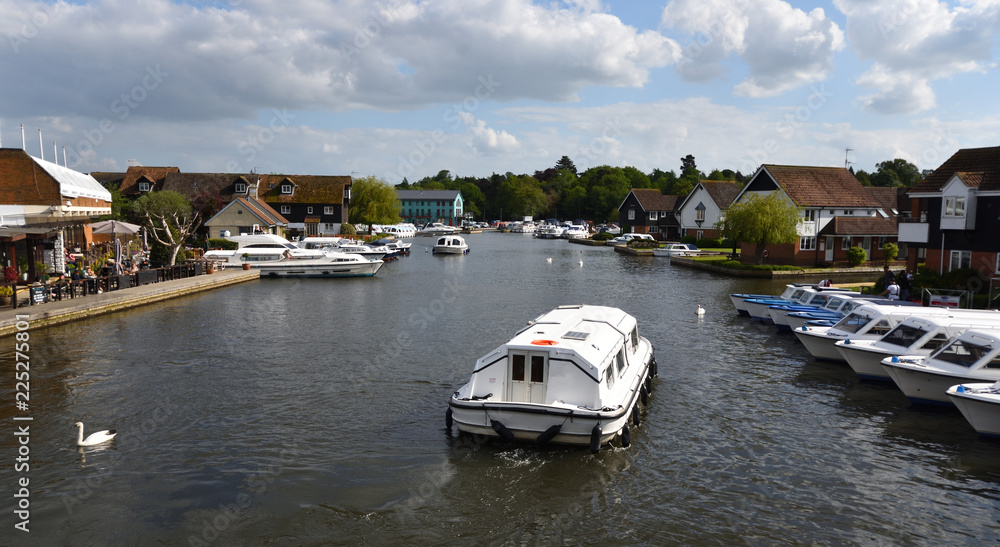 Fototapeta premium View of the river Bure at Wroxham with Broads cruise.
