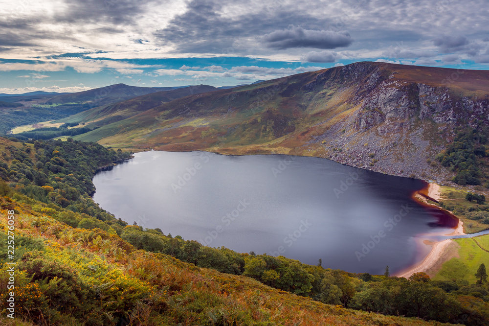 Fototapeta premium Guinness Lake - Lough Tay in the Wicklow Mountains near Dublin, Ireland