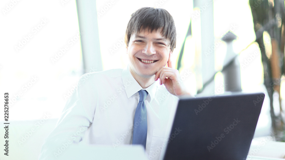 employee of the company working on the laptop. employee of the company working on the laptop.