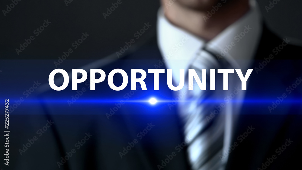 Opportunity, man in business suit in front of screen, future possibility, chance Opportunity, man in business suit in front of screen, future possibility, chance