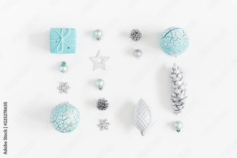 Obraz premium Christmas composition. Christmas gifts, blue decorations on white background. Flat lay, top view, copy space
