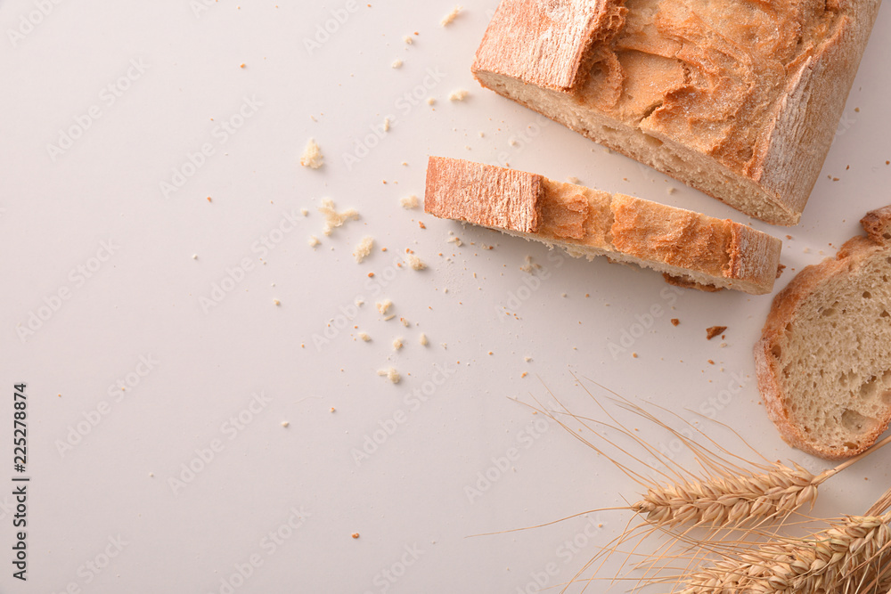 Whole loaf of bread on cutting board traditional vintage Whole loaf of bread on cutting board traditional vintage